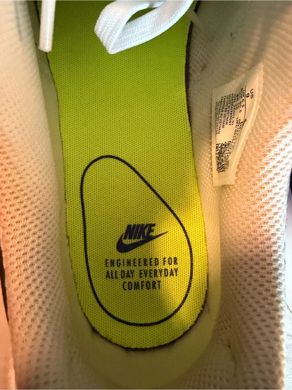 Nike Sneakers with Purple swoosh and Neon Accents
